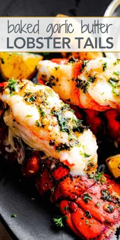 baked garlic butter lobster tails on a plate with lemon wedges and parsley garnish