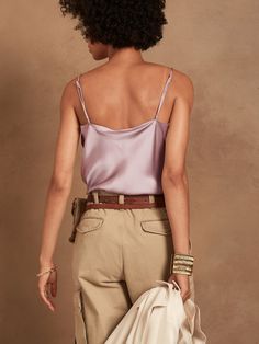 An indulgent, elegant essential, this versatile camisole is crafted from our washable silk charmeuse and cut on the bias for figure-flattering drape.  SEMI-FITTED: Cut for a not-too-tight, not-too-loose fit.  V-neck.  Adjustable slider straps.  Dolphin hem.  Unlined.  Semi-fitted.  Sleeveless.  Hip length.  Front bodice length (size S): Petite 17. 75", Regular 18. 5", Tall 20. 5" Model: Size S or XL, 5'10" (178cm).  Machine wash cold, gentle cycle, line dry. Silk Cami Tank Top With Built-in Bra, Elegant Solid Color Cami Tank Top, Silk Camisole With Built-in Bra, Feminine Silk Camisole With Built-in Bra, Silk Camisole With Built-in Bra And Tank Straps, Chic Solid Color Camisole, Feminine Silk Camisole With Adjustable Straps, Chic Satin Tank Top With Adjustable Straps, Solid Silk Sleeveless Camisole