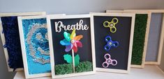 three framed pictures with different types of crafts on them