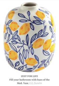 a white vase with yellow lemons painted on it and the words zest for life fill your bathroom with hues of the med