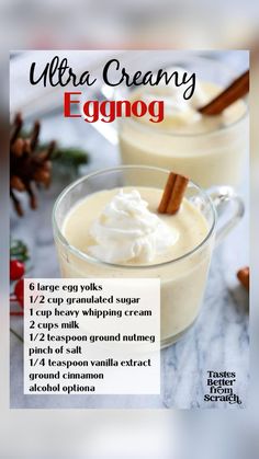 two glasses of eggnog with cinnamon sticks and whipped cream