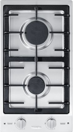 a white and black stove top with two burners