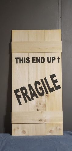 this end up fragile sign is made out of wood