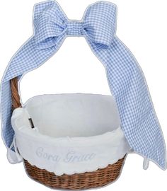 a blue and white gingham basket with a bow