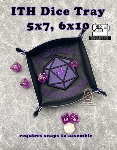 a purple and black plate with dices on it that says, ih dice tray 5x7, 6x10