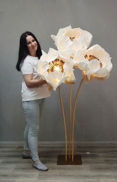 Introducing our exquisite flower-shaped lamp, a perfect blend of nature-inspired design and modern functionality. Crafted with meticulous attention to detail, this enchanting lamp features elegantly sculpted petals that radiate warmth and light, creating a serene ambiance for any space. The lamp is made from high-quality materials, ensuring durability and a soft, diffused glow that mimics the gentle illumination of sunlight. Available in a variety of vibrant colors, each design captures the essence of blooming flowers, making it a stunning focal point for your living room, bedroom, or study. With a user-friendly touch control, you can easily switch between different brightness levels, allowing you to set the perfect mood for any occasion--whether it's a cozy night in or a lively gathering Giant Floor Lamp, Flower Lamps, Floral Lamp, Home Decorations Ideas, Wedding Stand, Unique Table Lamps, Cement Art, Decorations For Christmas, Flower Lamp