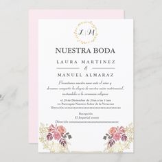 a wedding card with flowers on the front and bottom, in pink and gold foil