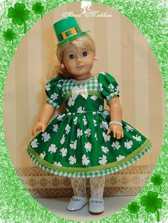 a doll wearing a green dress and hat with shamrocks on it's head