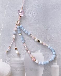 Phone Strap, Healing Crystal Phone Chain, Aquamarine,| Rose Quartz, Freshwater Beads Lanyard, Luxury Gemstone Phone Chain, Gift for Her The beaded portion measures approx. 9-10 inches, so it hangs approx. 4.5-5 inches from the strap. It is made with 0.8mm professional jewelry making waxed string for maximum durability. Together with a same color tone removable phone/USB/Key chain. You could clip on to a USB, Purse, or Key chain. Great gift for any occasion, Mother's Day, Birthdays, Anniversaries, etc Material: - Aquamarine beads (6mm, 4mm) - Rose Quartz (6mm, 4mm) - Freshwater pearl (6mm) - Pink crystal butterfly charm (15mm) - S925 silver spacer (4mm) - 14k gold-plated spacer (3mm, 4mm, 5mm) - 14k gold-plated spring ring (5mm) - 0.8 mm jewelry making waxed string ♥ Packaging: All jewelry Beads Lanyard, Y2k Phone, Phone Wristlet, Bracelets Design, Bead Charms Diy, Diy Bracelet Designs, Handmade Jewelry Tutorials, Beaded Lanyards, Phone Chain