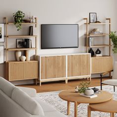 a living room filled with furniture and a flat screen tv mounted on a wall above a wooden entertainment center