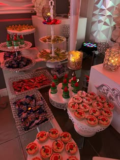 an assortment of desserts on display at a party