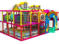 an indoor play area with several colorful slides