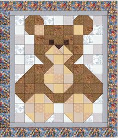 a bear is shown in the middle of a quilt