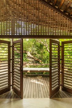 an open door leading to a wooden deck