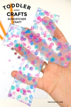 toddler crafts with suncather craft stickers on it and the words toddler crafts written in white letters