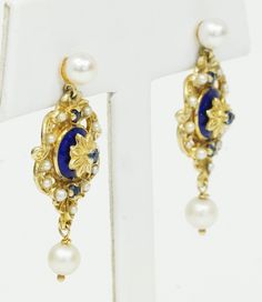 "Rare Antique Georgian Victorian Possibly French Design? 14K Yellow Gold Dangle Earrings with Seed Pearls, Blue Sapphires, Blue Enamel & Pearls Earring measures approx 1.4\" long x 0.6\" wide Pearls on Top and Bottom of earrings measure 5mm-5.5mm Weight: 8.1 grams Simply Gorgeous Pre-owned Earrings in Excellent Condition considering age. B6238" Antique Blue Earrings, Blue Hallmarked Dangle Jewelry, Blue Dangle Jewelry With Hallmark, Shield Ring, Gold Dangle Earrings, Seed Pearl, Diamond Solitaire Rings, Gold Earrings Dangle, Diamond Sizes