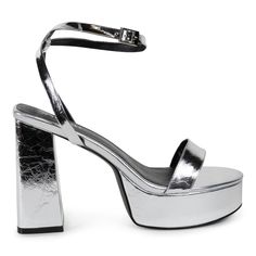 a woman's silver high heeled sandal