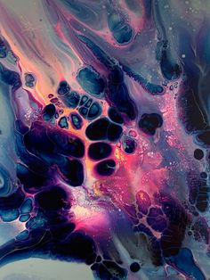 an abstract painting with blue, pink and purple colors on it's surface is featured in this image