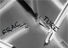 black and white photograph of medical instruments with writing on them that says frac tur