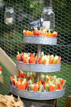 several trays filled with different types of food