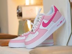 Step up your sneaker game with our Custom Pink Nike Air Force 1 Sneaker! These bold kicks will make a statement as you take on any challenge. The unique design adds a touch of risk-taking to your style. Step out in confidence and show off your adventurous side with these sneakers. 🔥 100% genuine, Brand New.👟 Custom sneakers.★Every pair is hand-made and unique.✨Best quality waterproof and scratch-proof paints used.🎉 1000+ satisfied customers across various platforms.🎁 Treat the shoes as art a Barbie Air Force Ones, Barbie Custom Shoes, Pink Custom Sneakers With Contrast Sole, Pink Sporty Custom Sneakers With Contrast Sole, Pink Custom Sneakers With Contrast Sole For Streetwear, Sporty Custom Pink Sneakers With Contrast Sole, Pink High-top Nike Air Force 1, Nike Air Force 1 High-top With Contrast Sole, Pink High-top Custom Sneakers For Streetwear