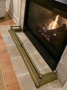 a fire place in the middle of a living room