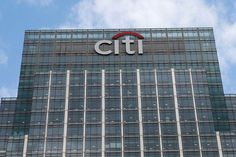 the citi logo is on top of a building