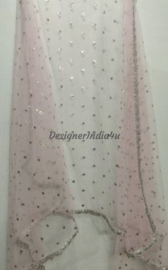 This is a Dupatta made on orders. It is made using dyeable net fabric with silver sequine embroidery all over. We make it colored as shown in the picture. Then we stitch a beautiful silver lace to all sides of it. Dupatta is having a length of 100 inches and width of around 40 inches. I don't keep it readymade I only make it exclusively for my customers. Can be fully customised. Eid Dupatta With Sequins, Eid Sequined Dupatta, Unstitched Sequined Dupatta For Eid, Pink Sequined Salwar Kameez For Eid, Pink Sequined Anarkali Set For Eid, Anarkali Eid Dupatta With Sequins, Anarkali Dupatta With Sequins For Eid, Anarkali Sequin Dupatta For Eid, Unstitched Pink Salwar Kameez For Party