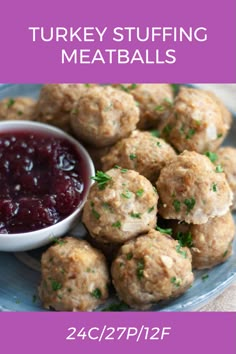 turkey stuffing meatballs on a plate with cranberry sauce