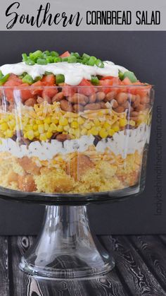 layered corn bread salad in a glass dish