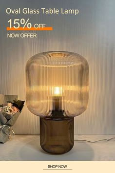 a table lamp that is on sale for $ 15 % off, and the light has been