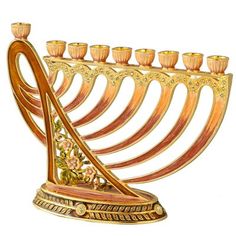 a golden menorah with candles in it