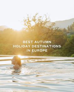 a woman swimming in a pool with the words best autumn holiday destinations in europe