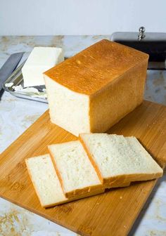 slices of bread sitting on top of a cutting board