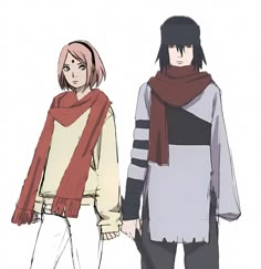 two people standing next to each other wearing scarves