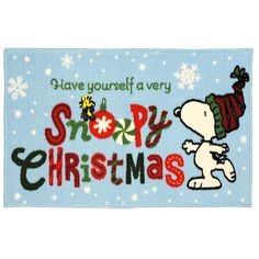 snoopy christmas door mat with the words have yourself a very snowy christmas