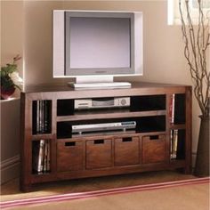 an entertainment center with a flat screen tv