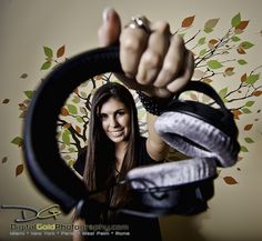 a woman is holding her hand up to the camera and making a frame with it