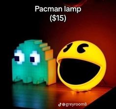 the pacman lamp is $ 15 and it's next to an illuminated ghost