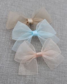 Sheer bows to match the bows on our popular glitter shoes, satin mary jane collection or to wear alone for more girly look. You can purchase these bows as a HAIR CLIP or SOFT ELASTIC NYLON HEADBAND. BOWS COME IN 2 DIFFERENT SIZES, PLEASE SELECT SIZE AT CHECKOUT: - SMALL: 4.25 INCHES - LARGE: 4.75 INCHES Feel free to contact me if you have any questions or need additional informations. Is this a gift? I will be more than happy to wrap this with a gift message. Thank you for shopping at Kailee P a Hair Clips Making, Handmade Bows For Hair, How To Make Hair Clips Diy, Diy Bow Hair Clips, Diy Hair Bows With Ribbon, How To Make Bows For Hair, How To Make Hair Bows, Handmade Clips, Bows For Hair