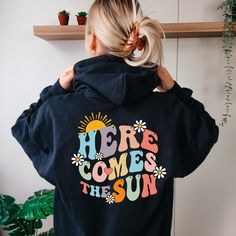 Here Comes The Sun Text Hoodie, Aesthetic Gift for Womens, Oversized Hoodie, Beach Hoodie for Girls, Positive Hoodie, Trendy Summer Hoodie 👉HOW TO ORDER👈 1️⃣  Choose your T-shirt color 2️⃣  Choose your T-Shirt size 3️⃣  Choose your design & text color 4️⃣ Need more Items? Add the current item in the cart. And If you like to add more items to your order please press the back button and repeat steps 1-3 again. 5️⃣Once all your desired items are in your cart you may complete your order by enterin Vsco Style Long Sleeve Hoodie With Letter Print, Winter Vsco Hoodie With Letter Print, Oversized Long Sleeve Vsco Hoodie, Vsco Style Sweatshirt Hoodie With Letter Print, Vsco Style Letter Print Hoodie Sweatshirt, Vsoc Style Hoodie Sweatshirt With Letter Print, Oversized Vsco Style Hoodie, Cotton Vsco Hoodie With Graphic Print, Cotton Graphic Print Vsco Hoodie