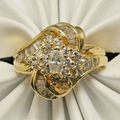 a close up view of a ring with diamonds on it