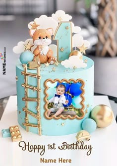 a birthday cake with an image of a baby in the center and balloons on top