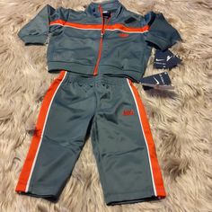 Grey Red Nike Track Suit / Sweatsuit 2pc Set- Size 12m Nike Sporty Sets For Playtime, Nike Sets For Winter Playwear, Nike Fitted Sports Sets, Fitted Nike Sports Sets, Nike Fitted Sportswear Sets, Sporty Fitted Sets For Playwear, Fitted Orange Playwear Sets, Nike Red Playwear Sets, Toddler Nike Outfits