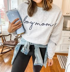 "Hands held up high if you're living that boy mom life. At least we can look cute when taking care of those crazy boys in our life! Our 'boy mom' full script embroidered sweatshirt is perfect to wear to those Saturday sports games, car pools or wherever our sweet boys love to have fun! Make it a double expresso as we try to keep up, and don't forget to pack those extra Band-Aids! Dress this up with skinny jeans and an adorable pair of flats, or dress down with your leggings and sneakers. - Unise Boy Mom Sweater, Boy Mama Sweatshirt, Boy Mom Shirt Ideas, Boy Mom Shirts, Boy Mom Sweatshirt, Boy Mom Shirt, Games Car, Covington Ky, Mom Crewneck