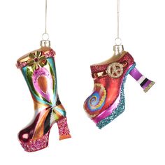 Add a touch of whimsy and luxury to your holiday décor with our 5.5" Glass Rainbow Platform Boot/Shoe Ornaments. The vibrant colors and intricate platform design evoke an air of exclusivity and creativity, making them the perfect addition to any fashion-forward or art-inspired holiday display. Set of 2 included for an extra touch of elegance. Boot Ornament, Shoe Ornaments, Platform Design, Hanging Christmas Tree, Holiday Display, Purple Christmas, Fairy Figurines, Christmas Dolls, Black Christmas