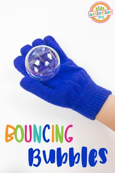 a blue glove with the words bouncing bubbles on it and a hand holding a soap ball