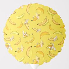 a bunch of bananas on a yellow background