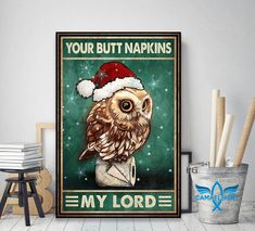 an owl wearing a santa hat on top of a poster