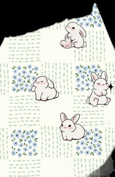 an image of rabbits and flowers on a white background with blue flowers in the corner